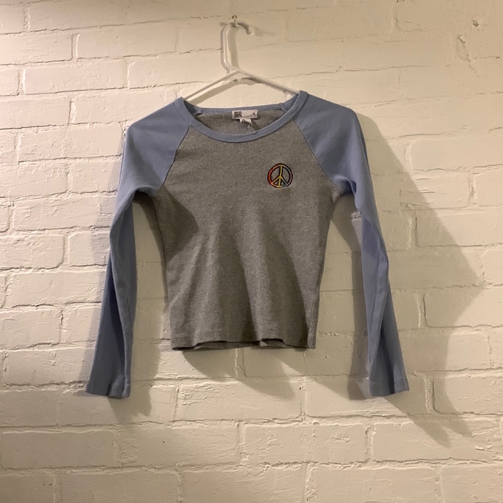we are selling a peace sign long sleeve from RSQ